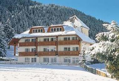 Sella Ronda a apartmánový dům La Selva v zimě